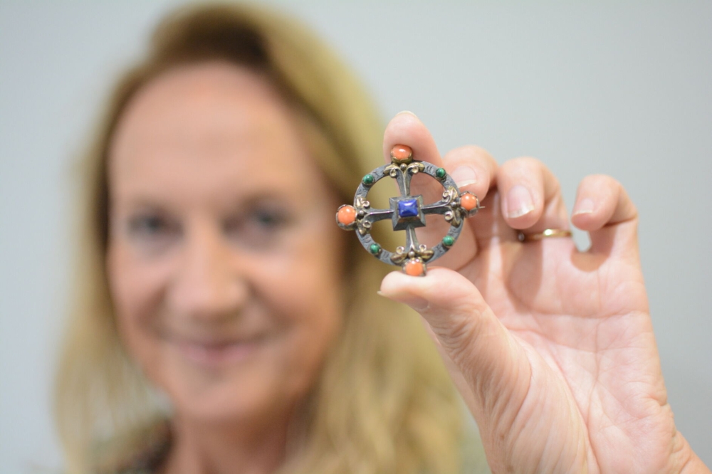 Flora Steel with a brooch she bought at an antique fair more than 30 years ago. Credit: Gildings Auctioneers