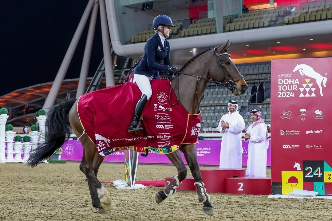 Evelina Tovek celebrates with 12-year-old gelding Moeboetoe v/D Roshoeve after her victory at the Doha Tour International Equestrian Championship yesterday.
