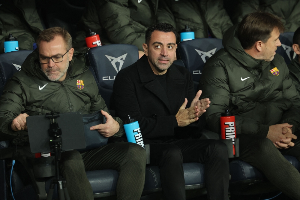 Barcelona's Spanish coach Xavi looks on before the start of the Spanish league football match between FC Barcelona and Villarreal CF on January 27, 2024. (Photo by Lluis Gene / AFP)
