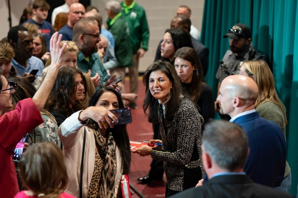 Republican presidential hopeful and former UN Ambassador Nikki Haley greets supporters at a rally on January 28, 2024 in Conway, South Carolina. (Photo by Allison Joyce / GETTY IMAGES NORTH AMERICA / Getty Images via AFP)
