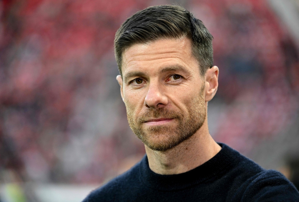 Bayer Leverkusen's Spanish coach Xabi Alonso looks on ahead the UEFA Europa League Group semi final second leg football match between Bayer Leverkusen and AS Roma in Leverkusen, on May 18, 2023. Photo by INA FASSBENDER / AFP