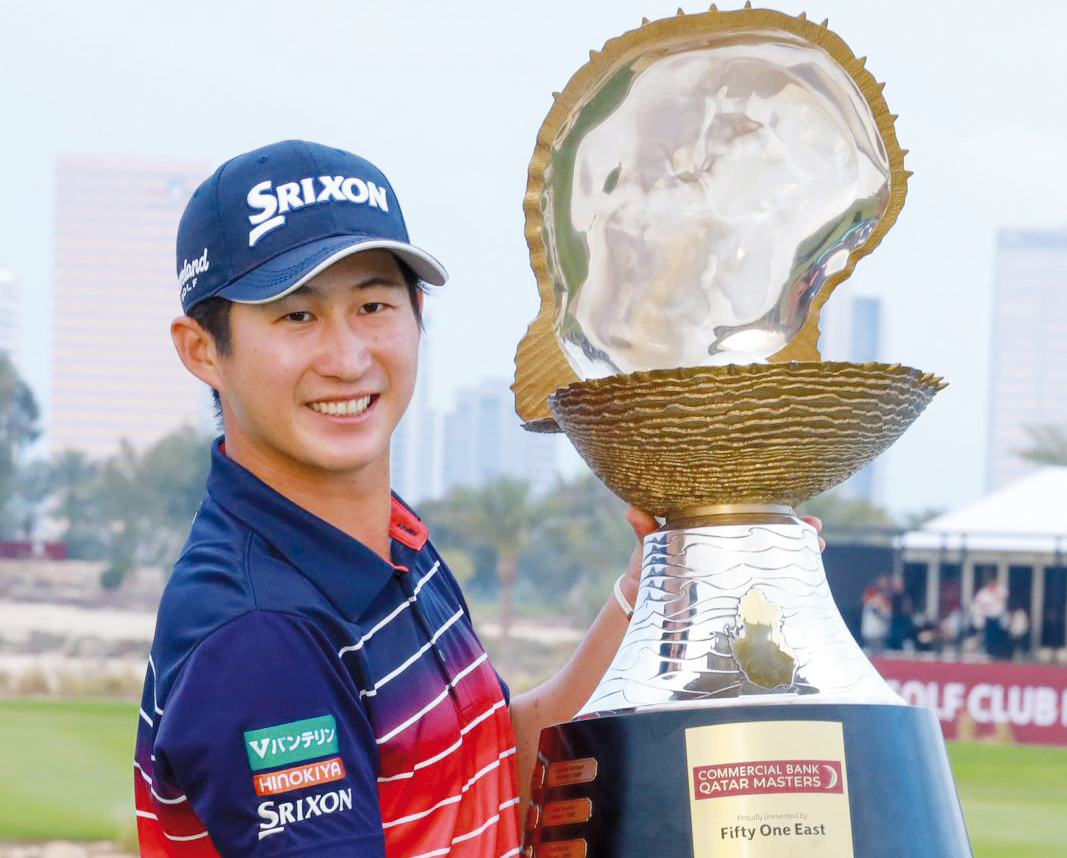 Japan’s Rikuya Hoshino poses with the Mother of Pearl trophy.