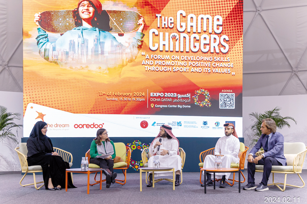 President of the Qatar Boxing and Wrestling Federation Sheikh Fahad Al Thani (centre) speaks during the forum.  
