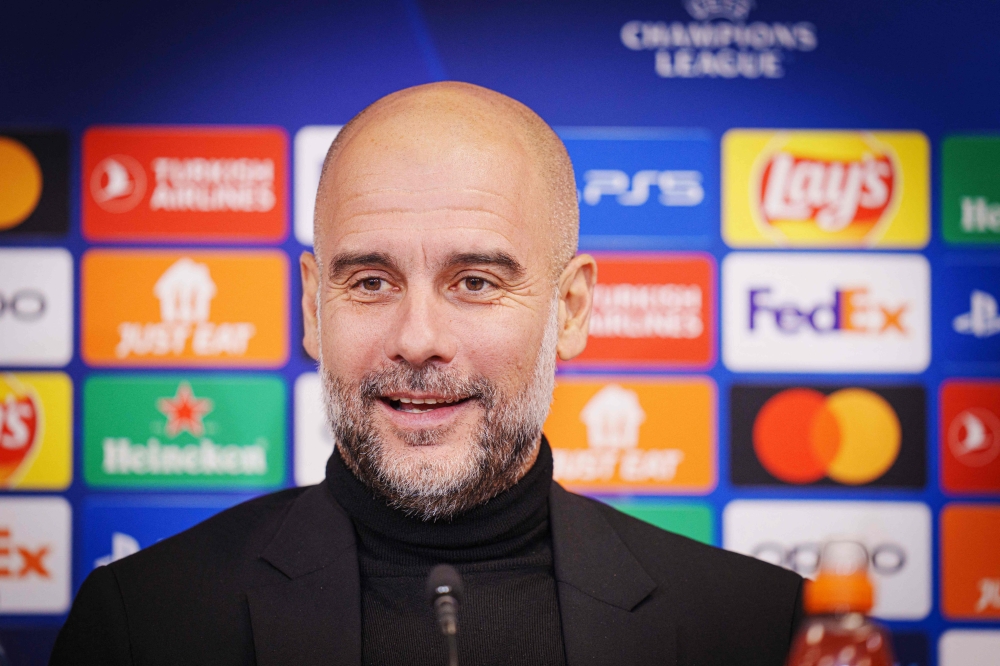 Manchester City's Spanish manager Pep Guardiola addresses a press conference on February 12, 2024, the eve of the UEFA Champions League round of 16 first-leg football match between FC Copenhagen and Manchester City at Parken Stadium in Copenhagen, Denmark. (Photo by Liselotte Sabroe / Ritzau Scanpix / AFP) / Denmark OUT
