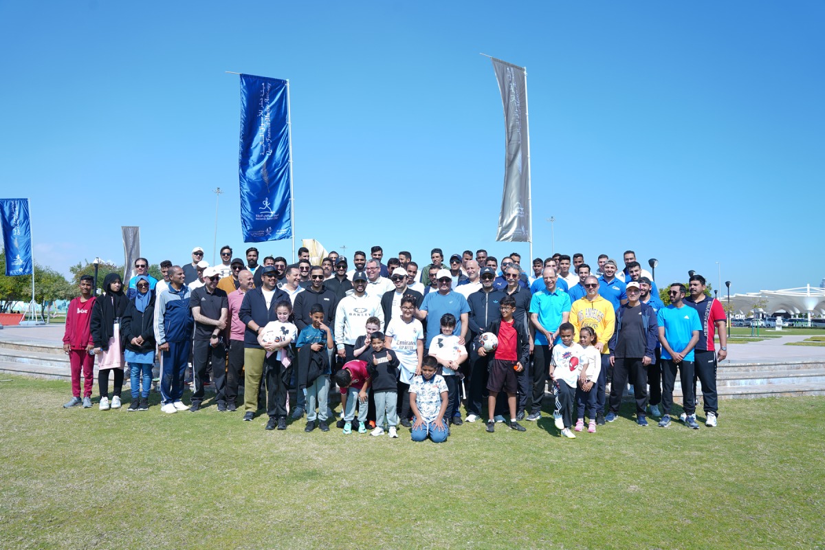 QFMA CEO Tamy Bin Ahmad Al Binali along with other officials and local community participates in National Sport Day.