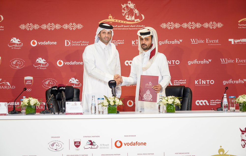 QEF Secretary-General and Chairman of Festival’s Supreme Organising Committee Sheikh Ahmed bin Nouh Al Thani and Doha Bank representative Sheikh Mohammad bin Fahad bin Jabor Al Thani shake hands after signing the sponsorship. 
