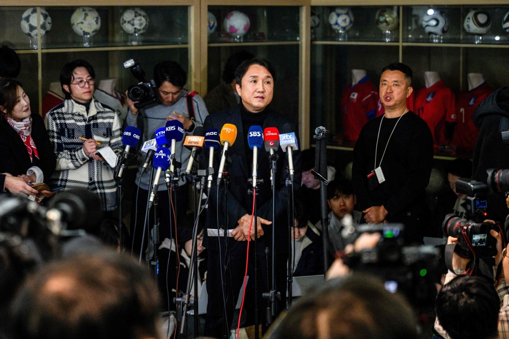 Hwangbo Kwan (C) of the Korea Football Association's national team committee holds a press briefing at the Korea Football Association (KFA) in Seoul on February 15, 2024. Photo by Anthony WALLACE / AFP