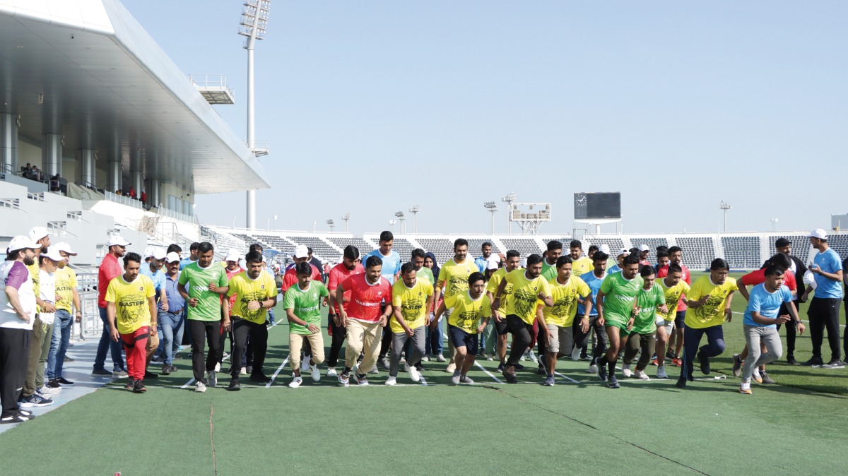 Wellcare Group staff and guests participating in a sporting event.