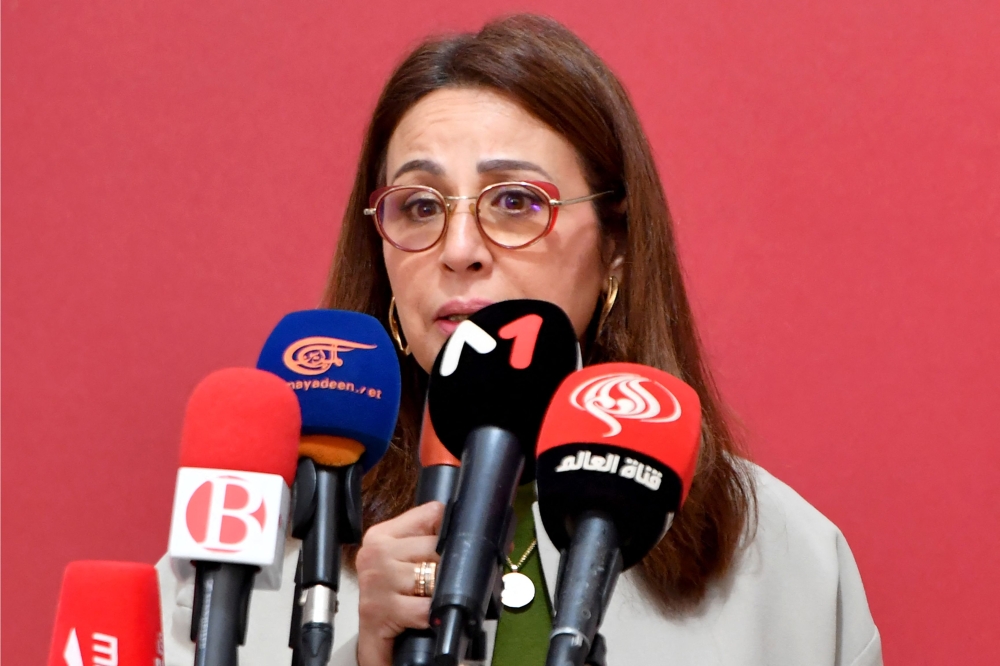 Dalila Ben Mbarek, the lawyer and member of the defense committee of detainees accused of involvement in a conspiracy case against state security, addresses a press conference in Tunis on February 21, 2024. (Photo by FETHI BELAID / AFP)
