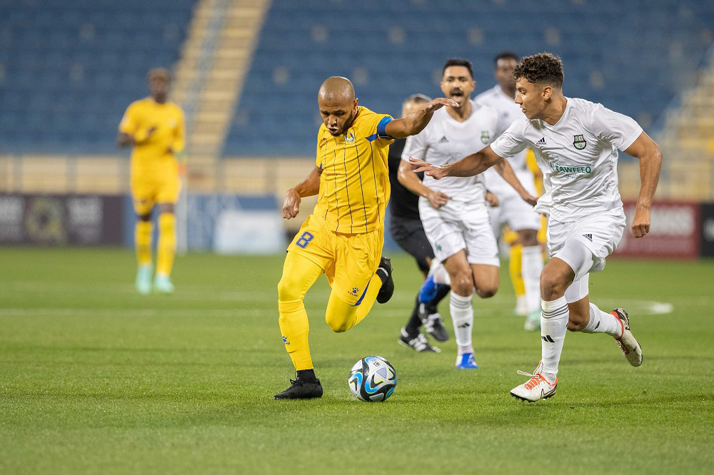 Action during the match between Al Ahli and Al Gharafa yesterday. PIC: QNA  