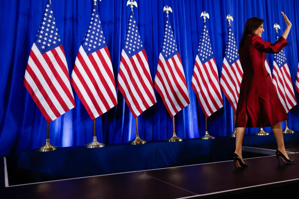 US Republican Presidential hopeful and former UN Ambassador Nikki Haley walks on stage to speak at her election night watch party in Charleston, South Carolina, on February 24, 2024. (Photo by Julia Nikhinson / AFP)

