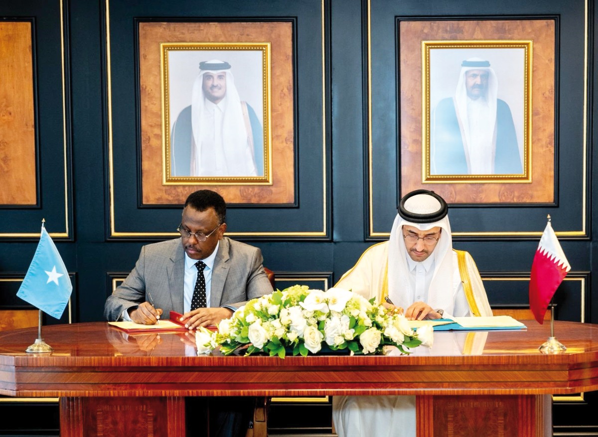 Minister of Justice and Minister of State for Cabinet Affairs H E Ibrahim bin Ali​ Al Muhannadi and Somalia's Minister of Justice H E Hassan Mo’allin Mohamoud signing an agreement yesterday.