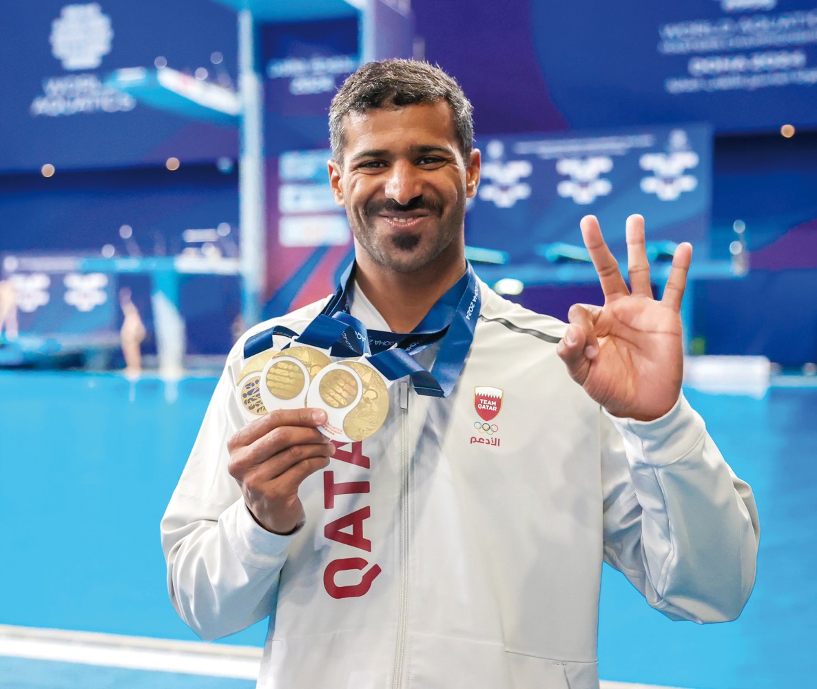 Mohammed Shewaiter celebrates with his gold medals.