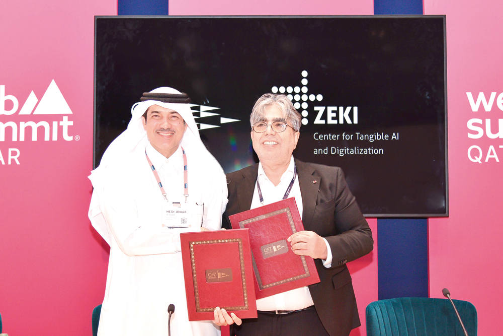 Minister of State and Chairman of QFZ, H E Dr. Ahmad Al Sayed and Chairman of the Board of Zentrum für erlebbare Künstliche Intelligenz und Digitalisierung e.V. ZE-KI e.V, Prof Dr. Sahin Albayrak at the MoU signing.
