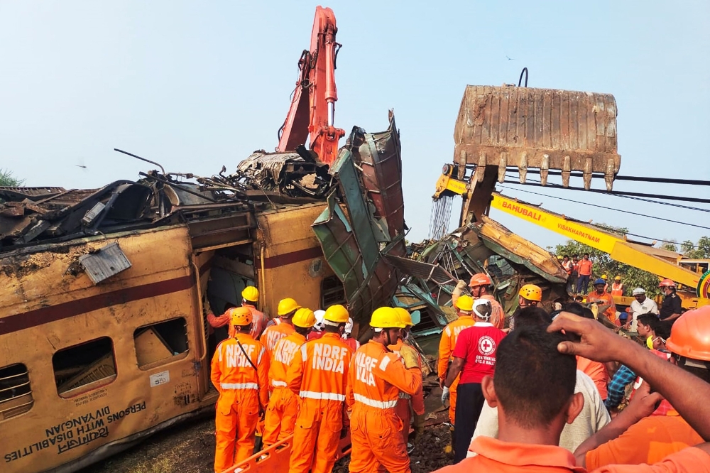 (Files) Members of the National Disaster Response Force (NDRF) conduct rescue operation at the site of train crash in Vizianagaram district of India's Andhra Pradesh state on October 30, 2023. (Photo by AFP)