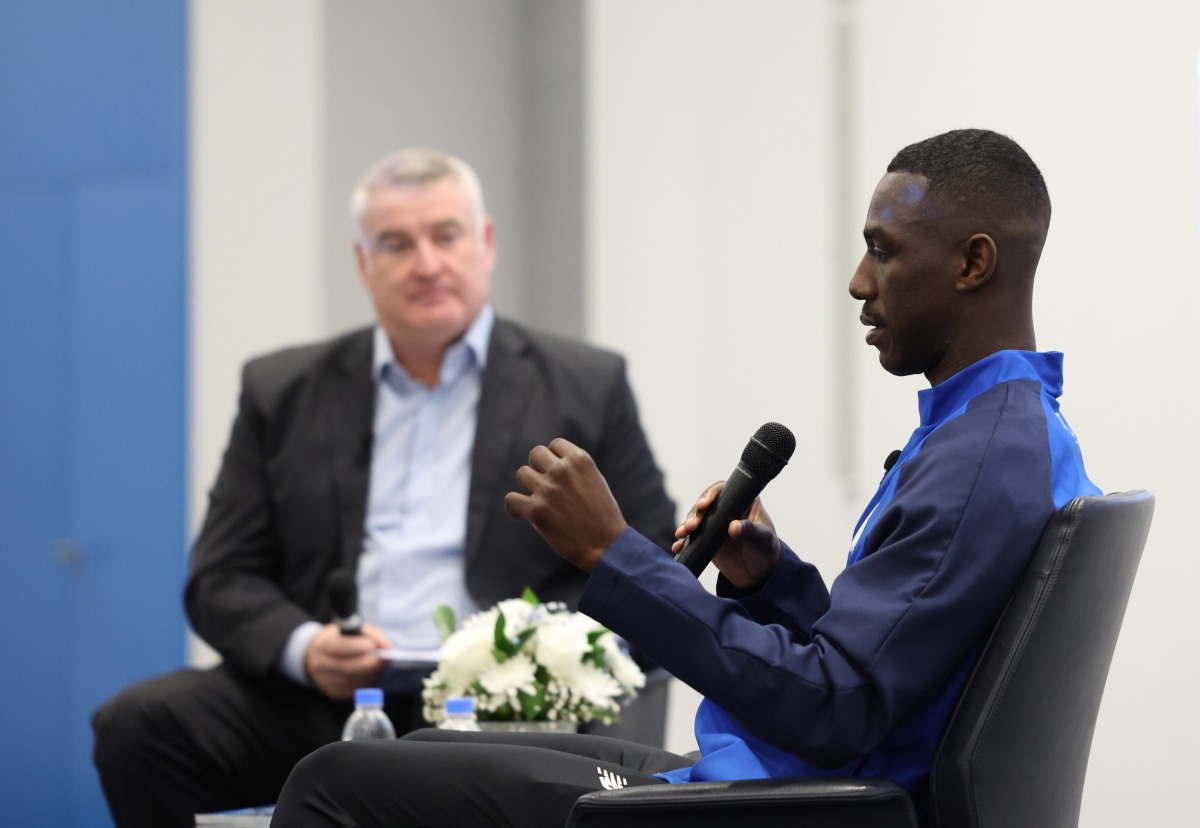 Almoez Ali (right) speaks during the launch.