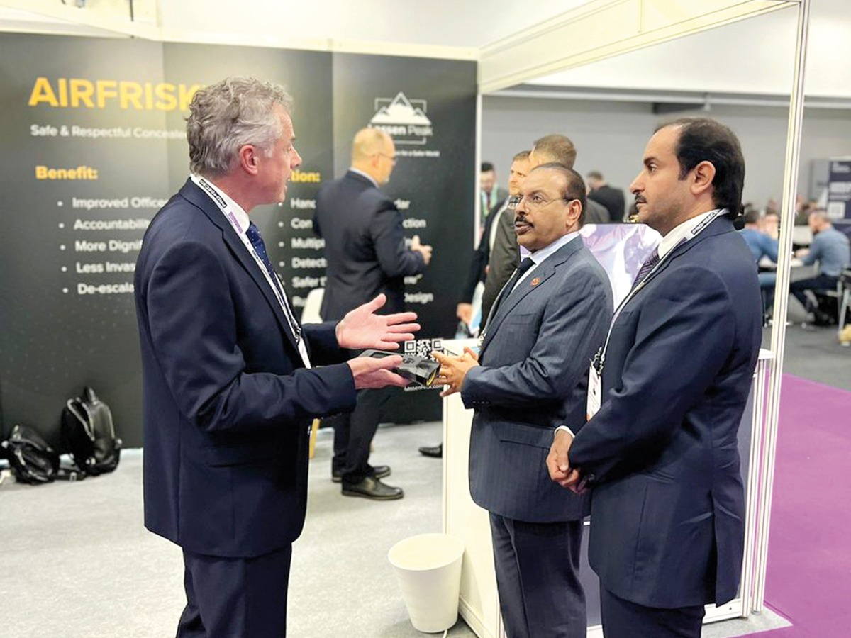 Chairman of Milipol Qatar Committee Major General Nasser bin Fahd Al Thani (centre) and member of the Committee Colonel Nasser bin Saad Al Otaibi (right) with a participant at the event.