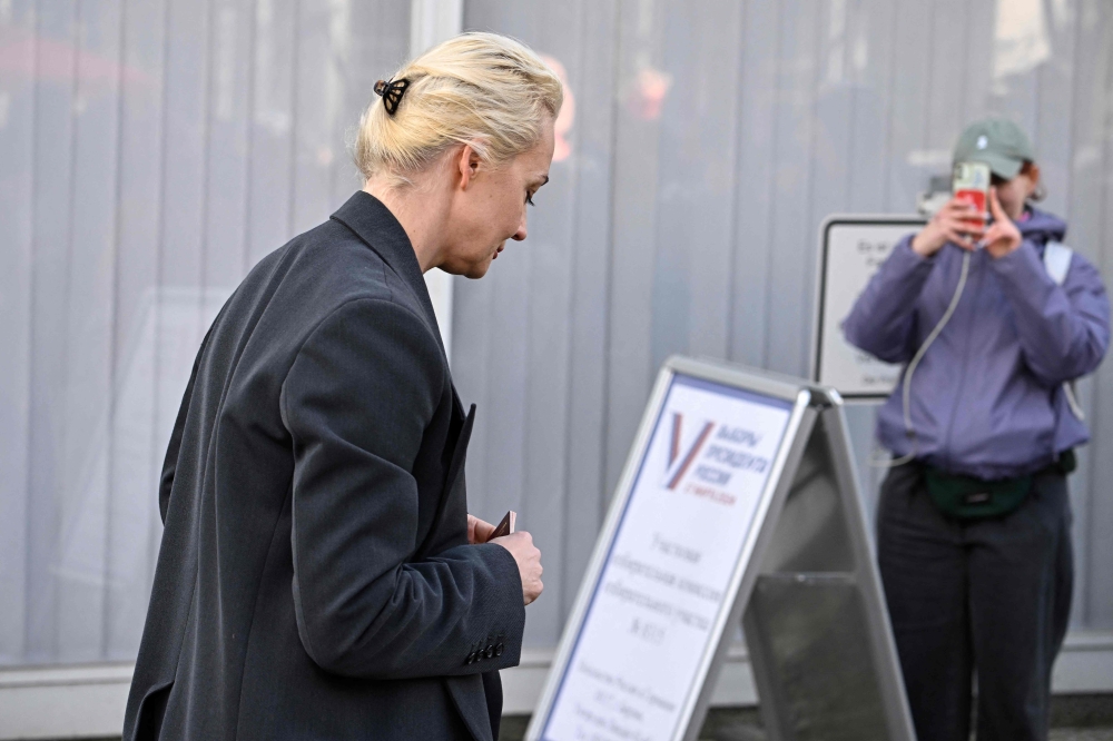 Yulia Navalnaya, widow of the late Kremlin opposition leader Alexei Navalny, arrives to vote in the Russia's presidential election at the Russian embassy in Berlin, on March 17, 2024. Photo Credit: Tobias SCHWARZ / AFP.