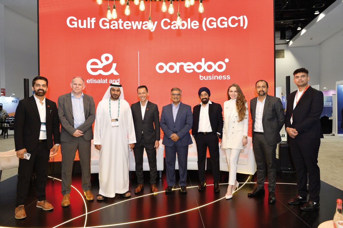 Najib Khan, Group Chief Business Services Officer, Ooredoo; Nabil Baccouche, Group Chief Carrier and Wholesale Officer, e& with other officials.