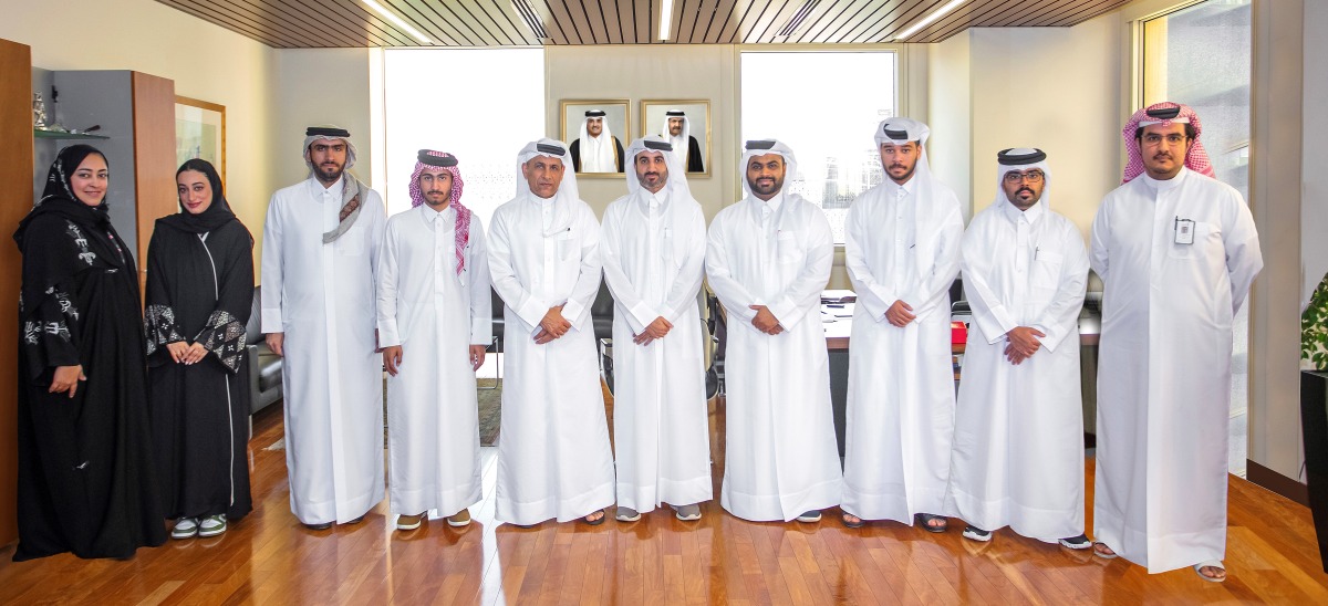 HBSC officials pose for a group photo with the students.