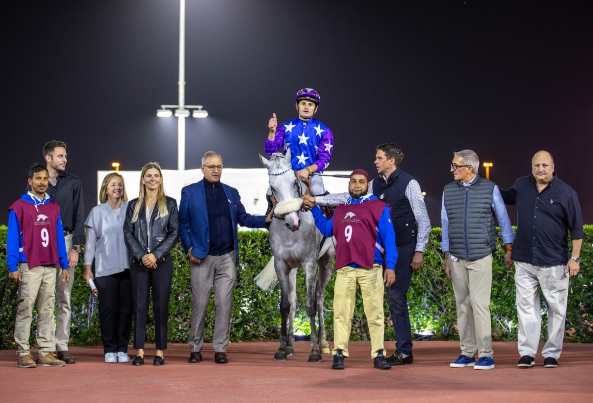 The connections of Mkaee’lat Al Shahania celebrate after winning the Al Wakra Cup at the 37th Al Rayyan Meeting, hosted by the Qatar Racing and Equestrian Club. (Pic: Juhaim/QREC)