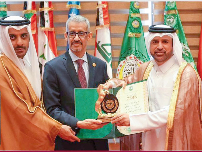 Katara General Manager Prof. Dr. Khalid bin Ibrahim Al Sulaiti (right) receiving the classification certificate and shield from Director-General of Alecso, Dr. Mohamed Ould Amar, in Tunis.  