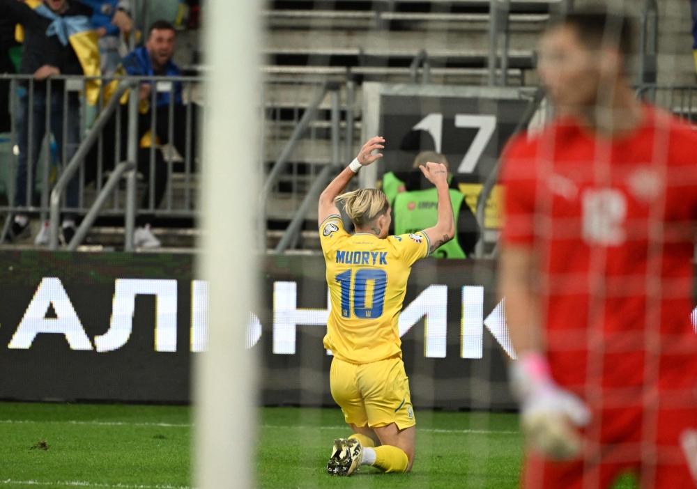 Ukraine's midfielder #10 Mykhaylo Mudryk celebrates celebrates scoring his team's second goal during the UEFA's EURO 2024 qualification final play off football match between Ukraine and Iceland, in Wroclaw, Poland, on March 26, 2024. (Photo by Sergei GAPON / AFP)
