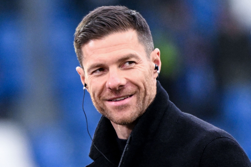 Bayer Leverkusen's Spanish head coach Xabi Alonso is interviewed prior to the German first division Bundesliga football match between SV Darmstadt 98 and Bayer 04 Leverkusen in Darmstadt, western Germany on February 3, 2024. (Photo by Kirill Kudryavtsev / AFP)