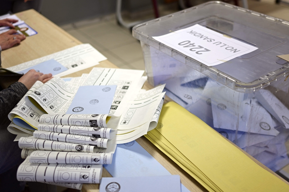 A ballot box is seen during the vote for the municipal elections at a polling station in Istanbul on March 31, 2024. (Photo by Yasin Akgul / AFP)