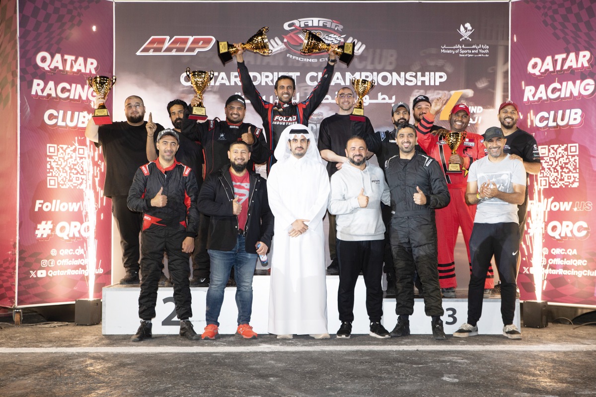 QRC Director Sheikh Jabor bin Khalid Al Thani with the podium winners of the fourth round. 
