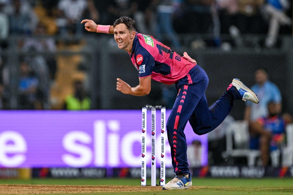 Rajasthan Royals' Trent Boult bowls during the Indian Premier League (IPL) Twenty20 cricket match between Mumbai Indians and Rajasthan Royals at the Wankhede Stadium in Mumbai on April 1, 2024. (Photo by Punit PARANJPE / AFP)