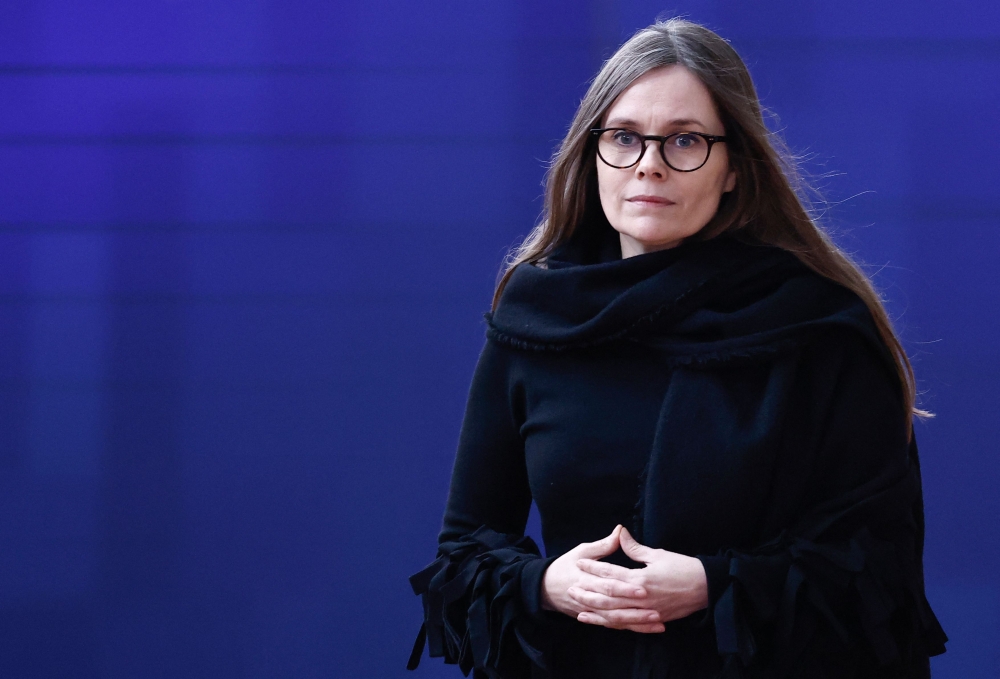 FILES) Iceland's Prime Minister Katrin Jakobsdottir arrives to attend a European Council summit during the second and last day at the EU headquarters, in Brussels, on March 22, 2024. (Photo by Sameer Al-Doumy / AFP)
