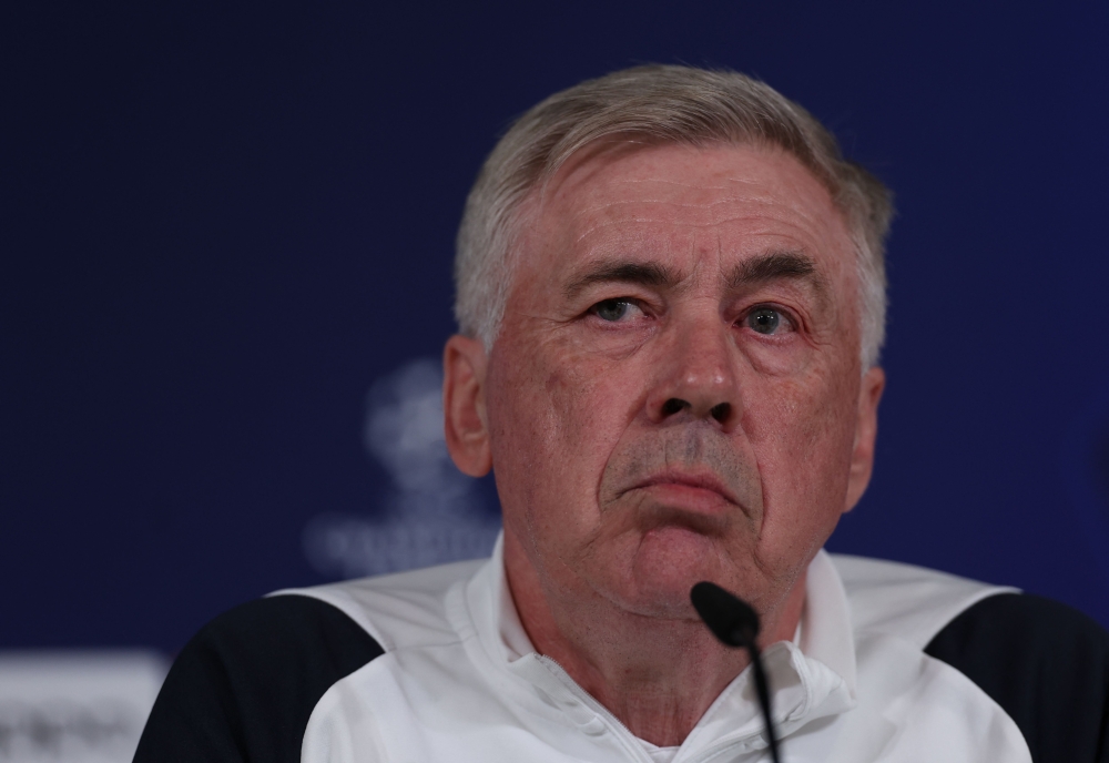 Real Madrid's Italian coach Carlo Ancelotti gives a press conference on the eve of their UEFA Champions League quarter final first leg football match against Manchester City at the Real Madrid Sport City in Valdebebas, on the outskirts of Madrid on April 8, 2024. (Photo by PIERRE-PHILIPPE MARCOU / AFP)
