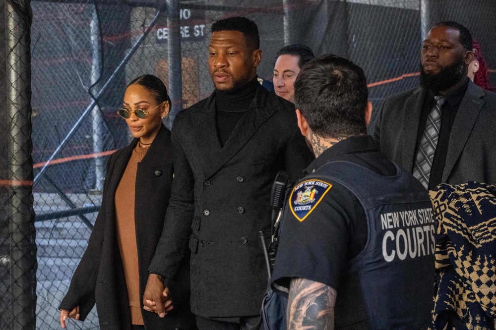 Actor Jonathan Majors departs with girlfriend Meagan Good from his sentencing hearing in the domestic abuse case at Manhattan Criminal Court on April 8, 2024 in New York City. (Photo by David Dee Delgado / GETTY IMAGES NORTH AMERICA / Getty Images via AFP)
