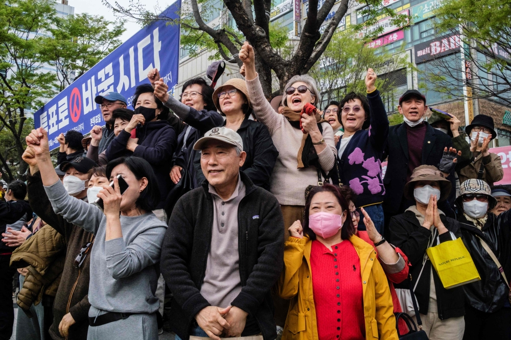 Supporters attend a campaign rally for South Korea's ruling People Power Party ahead of the upcoming parliamentary elections in Seoul on April 8, 2024. Photo by ANTHONY WALLACE / AFP.