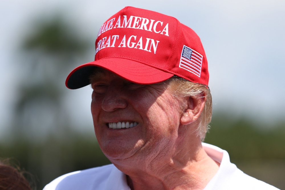 Former US President Donald Trump is seen at the driving range during day three of the LIV Golf Invitational - Miami at Trump National Doral Miami on April 07, 2024 in Doral, Florida. (Photo by Megan Briggs / Getty Images via AFP)