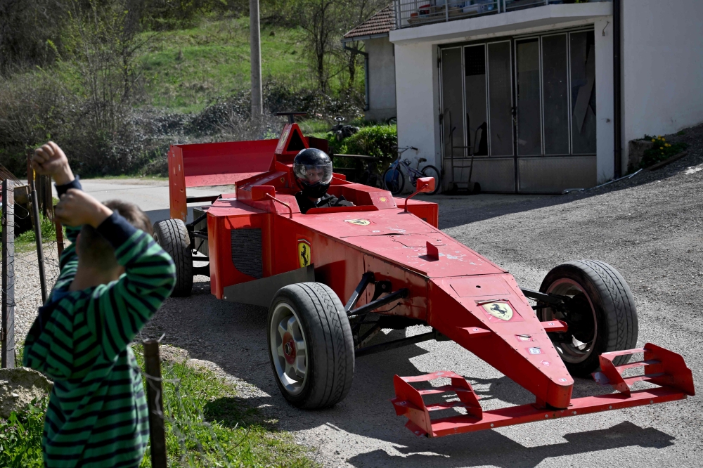 Himzo Beganovic drives his replica 