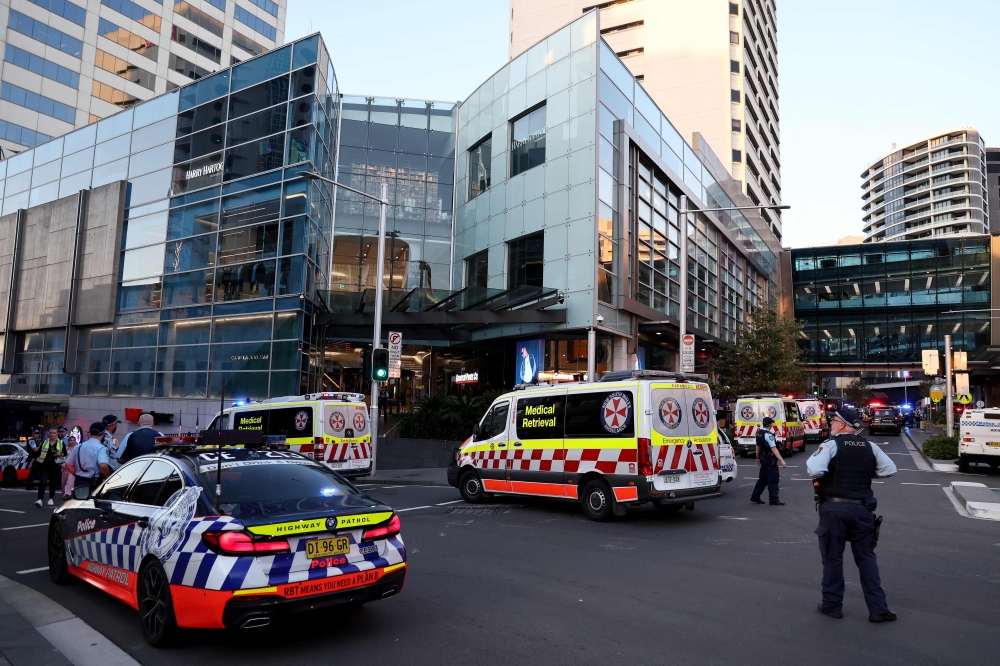 Police cordon off the Westfield Bondi Junction shopping mall after a stabbing incident in Sydney on April 13, 2024. Photo by DAVID GRAY / AFP

