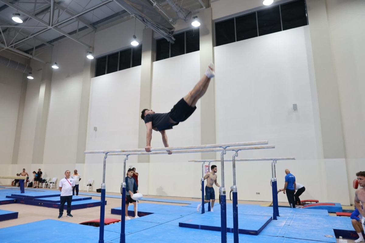 A gymnast in action during a training session ahead of the Artistic Gymnastics World Cup Doha 2024. 