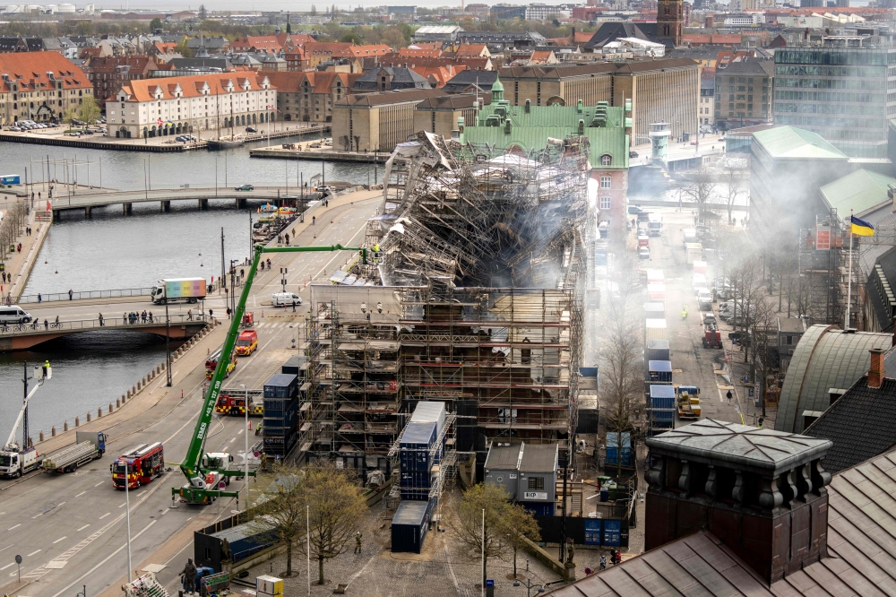 Work continues on the fire at the historic Boersen stock exchange building in central Copenhagen, Denmark on April 18, 2024. Photo by Ida Marie Odgaard / Ritzau Scanpix / AFP