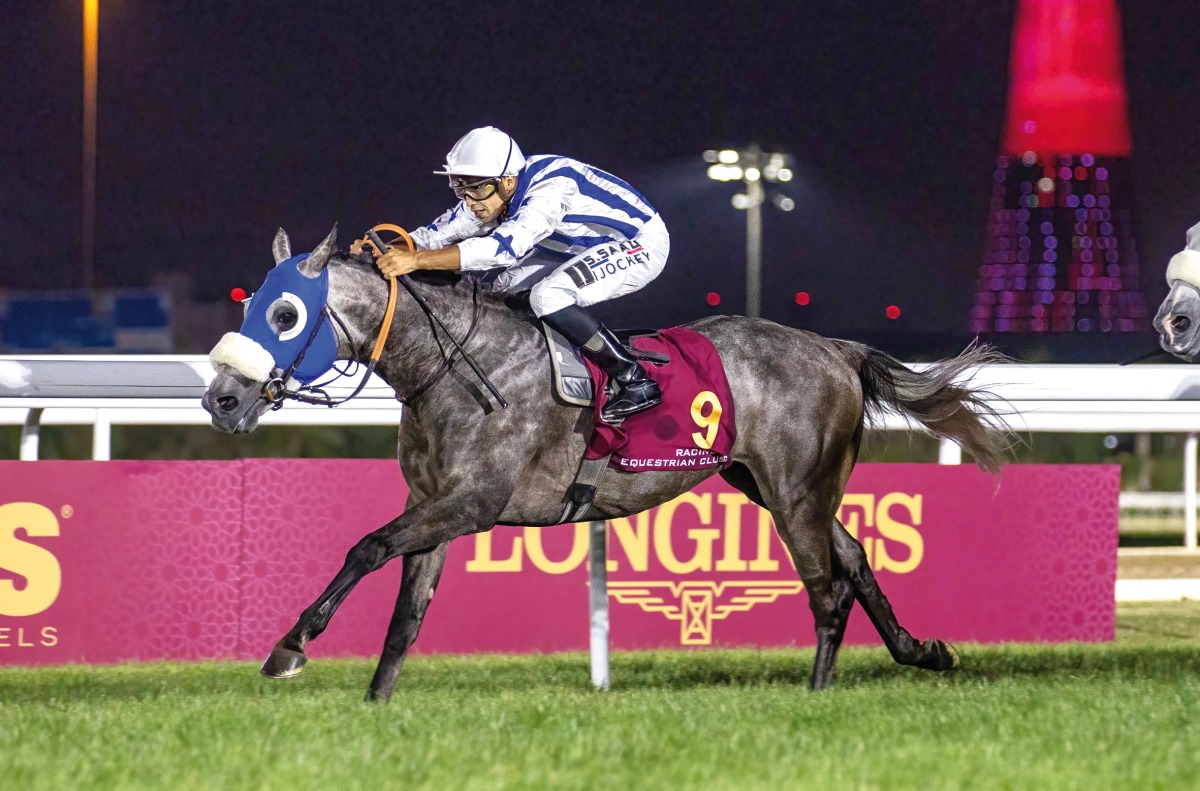 Soufiane Saadi steers Fayq Al Shahania to victory yesterday. RIGHT: The connections of Fayq Al Shahania celebrate after the Musheireb Cup win. PICS: Juhaim/QREC  