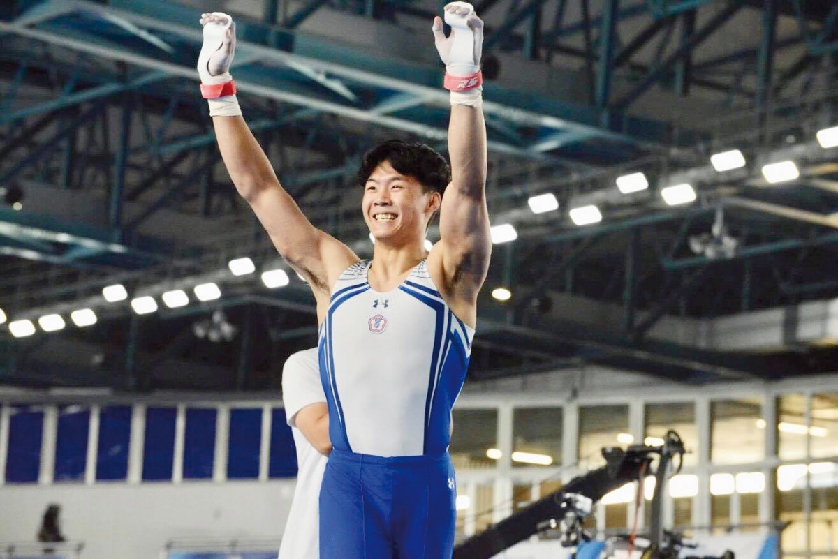 Chinese Taipei's Tang Chia-Hung celebrates yesterday