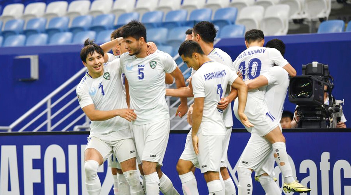 Uzbekistan players celebrate during their match against Kuwait yesterday. PIC: AFC