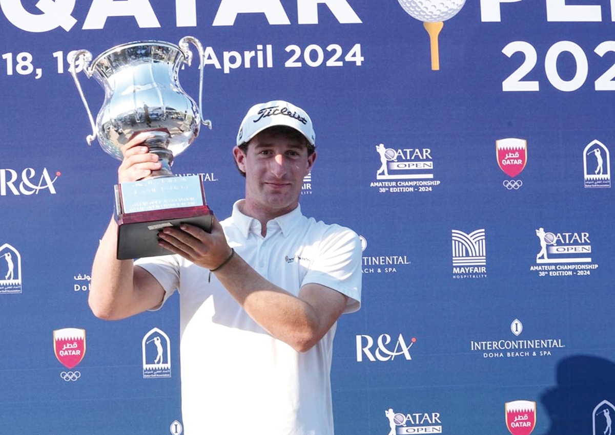 England's Calum Fitzgerald poses with the Qatar Open trophy.