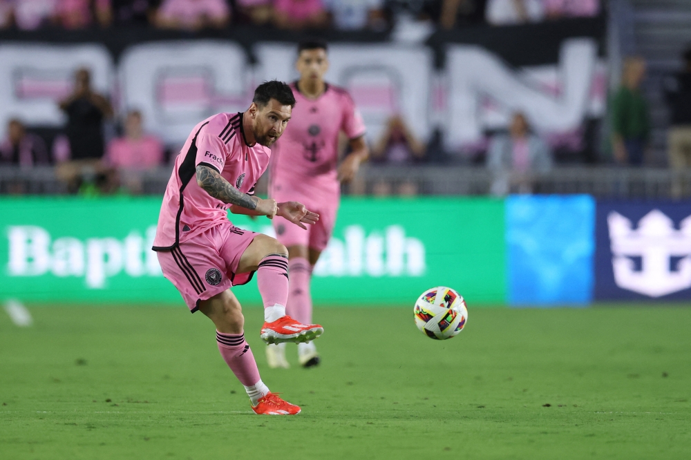 Lionel Messi #10 of Inter Miami takes a shot during the first half against the Nashville SC at DRV PNK Stadium on April 20, 2024 in Fort Lauderdale, Florida. Megan Briggs/Getty Images/AFP 