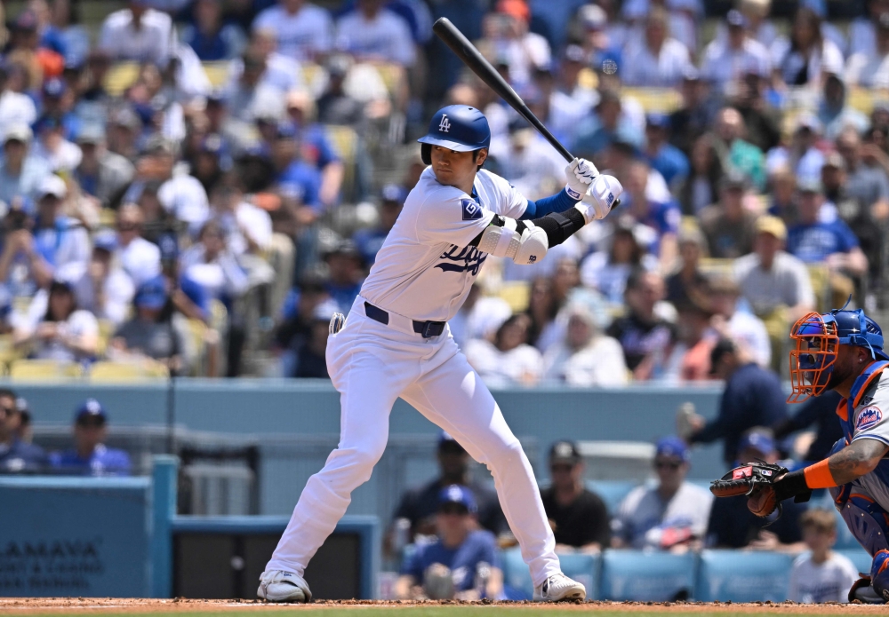 Shohei Ohtani #17 of the Los Angeles Dodgers bats against the New York Mets in the first inning at Dodger Stadium on April 20, 2024 in Los Angeles, California. (Photo by John MCCOY / GETTY IMAGES NORTH AMERICA / Getty Images via AFP)