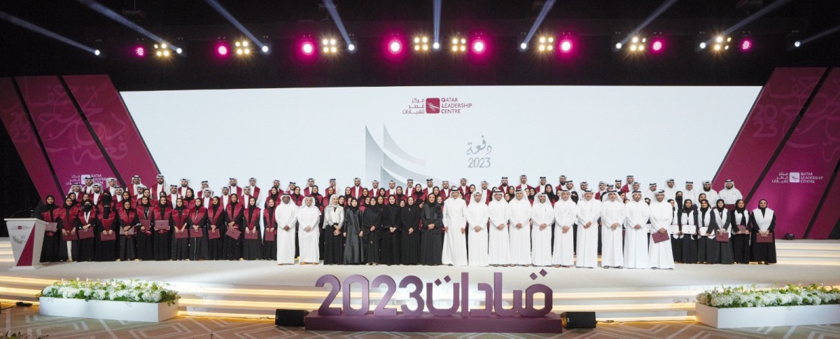 Speaker of Shura Council H E Hassan bin Abdullah Al Ghanim, Chairperson of the Qatar Leadership Center Board of Directors H E Sheikha Al Mayassa bint Hamad bin Khalifa Al Thani, Vice Chairman and Managing  Director of the Board of Directors H E Sheikh Dr. Abdullah bin Ali bin Saud Al Thani,  with graduates during the graduation ceremony.