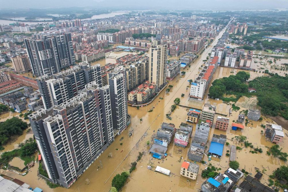 This aerial photo taken on April 22, 2024 shows a general view of flooded buildings and streets after heavy rains in Qingyuan city, in China southern Guangdong province. Photo by CNS / AFP.