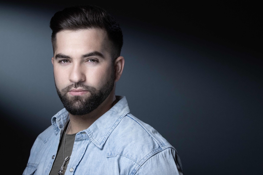 French singer Kendji Girac poses during a photo session in Paris on March 22, 2021. Photo by JOEL SAGET / AFP.