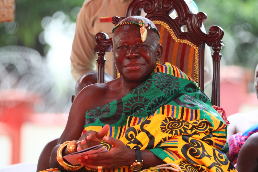 Otumfuo Osei Tutu II, Ghana's Asante king, looks on during the ceremony to exhibit the return of artefacts from the British Museum and the Victoria and Albert Museum (V&A), on a three-year loan at the Manhyia Palace in Kumasi, Ghana, on May 1, 2024. (Photo by Nipah Dennis / AFP)

